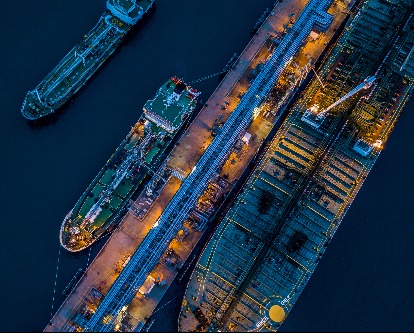 cargo ships pulling into port