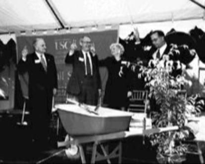 Jane Hoffman giving the fight on hand sign