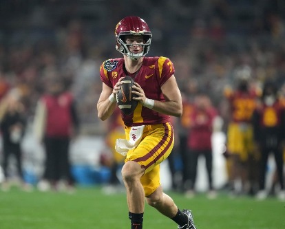 Miller Moss running with the football in the Holiday Bowl