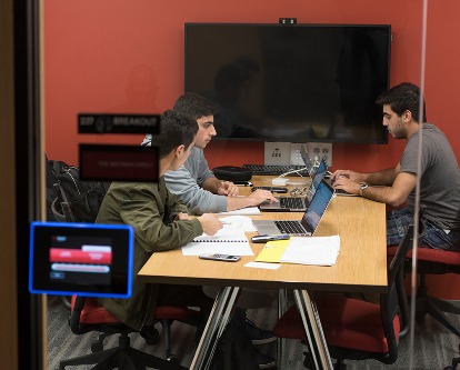 Three students in a breakout room at USC Marshall.