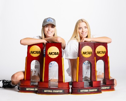 Audrey and Nicole Nourse with National Championship trophies