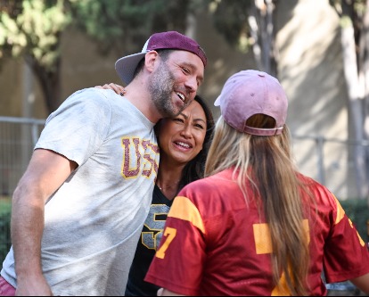 Alumni engaging in conversation at an event