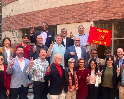 Alumni Honor Founding MBV Director Robert Turrill with Commemorative Plaque