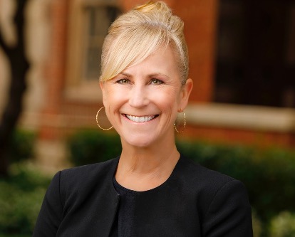 Dean's Cabinet Member Rachel Morell standing in a courtyard