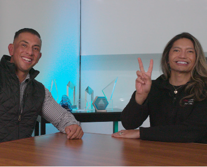 Hector Cabrera and Michael Paranal giving the Fight On sign.