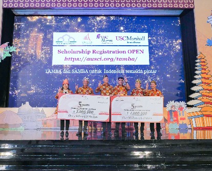 Dan Geoff Garrett standing with donors and two huge $1million checks.