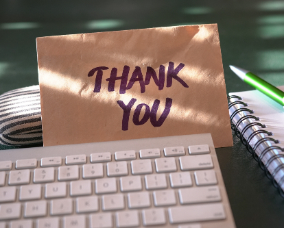 Thank you card on a keyboard
