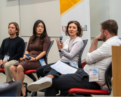 Florenta Teodoridis, Nan Jia, Milan Miric, and Andrew Ogilvie speak on a panel at the summit.
