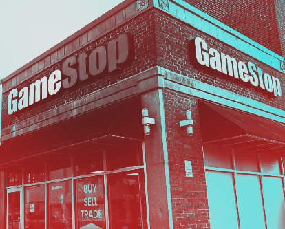 Duotone photograph of the entrance to a GameStop store.