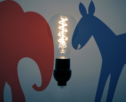 Lightbulb flanked by red elephant and blue donkey.