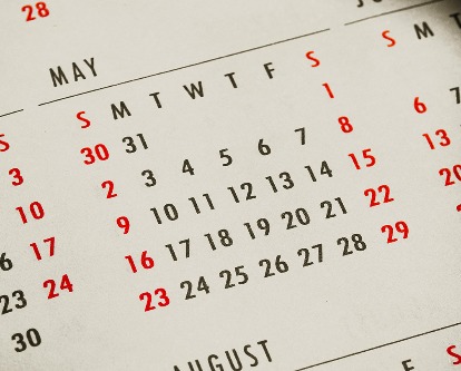 An analog calendar displaying May.