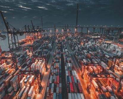 Overhead shot of a massive yard of shipping containers.