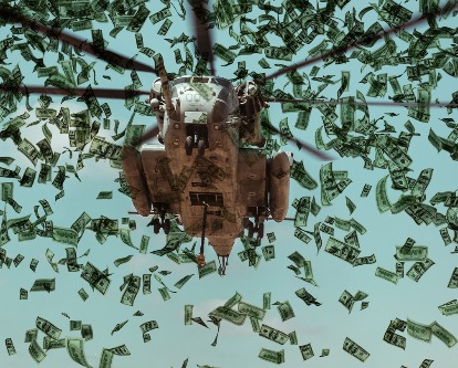Color photograph looking upwards to a military helicopter with thousands of dollar bills flying in the air.