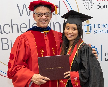 Color photograph of USC professor Gerald Giaquinta and WBB student.