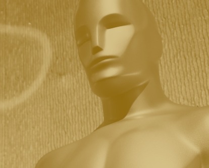 Color gold duotone image looking up at the Oscar statue.