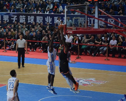 An in-game photo of a basketball game being played in China.
