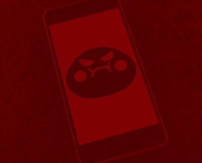 Red duotone image of a smartphone with an illustration of a frustrated face.