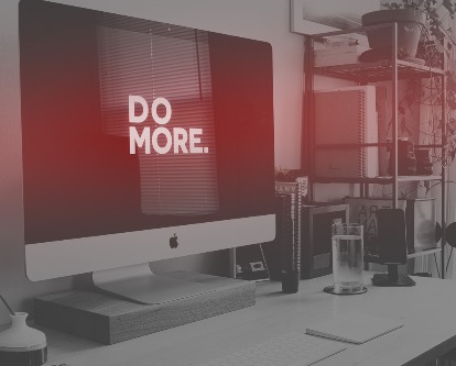 A computer screen with the words &quot;Do More&quot;.
