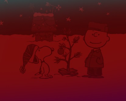 Snoopy and Charlie Brown standing in the snow looking at Charlie's tree.