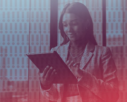 A female-presenting executive sending a message from a tablet. Exclamation points are superimposed over the image.