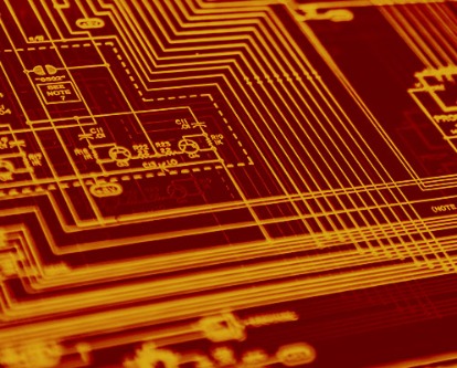 Cardinal and gold duotone image of digital circuitry.