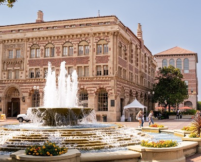 Color photograph of Hahn Plaza, with students walking by fountain