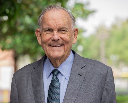 Color photograph of Dean William Holder and professor Shane Heitzman of USC Leventhal and USC Marshall respectively.