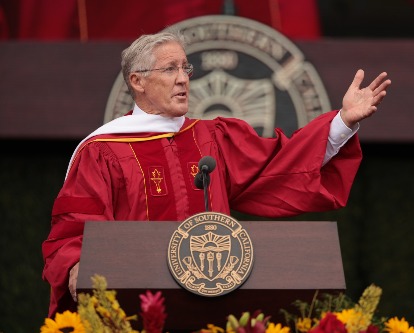 Pete Carroll speaking at commencement