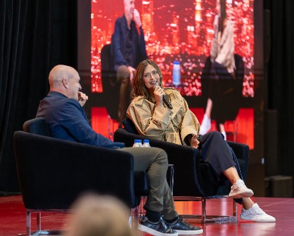 Maria Sharapova speaking with Jason Kelly