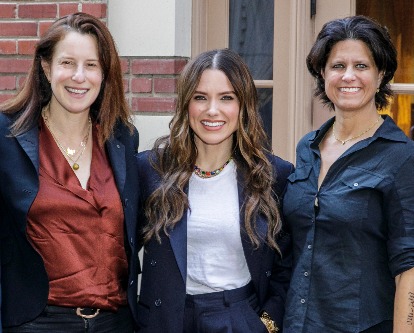 Kara Nortman, Sophia Bush, and Julie Uhrman pose in front of Town and Gown.